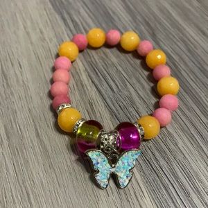 Handmade peachy butterfly bracelet